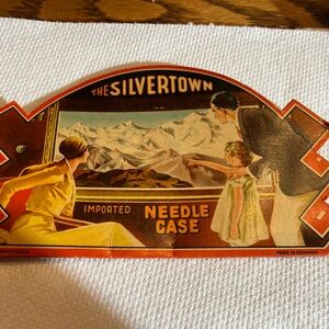 Silver Jeans Needle Case with Red and Brown Design